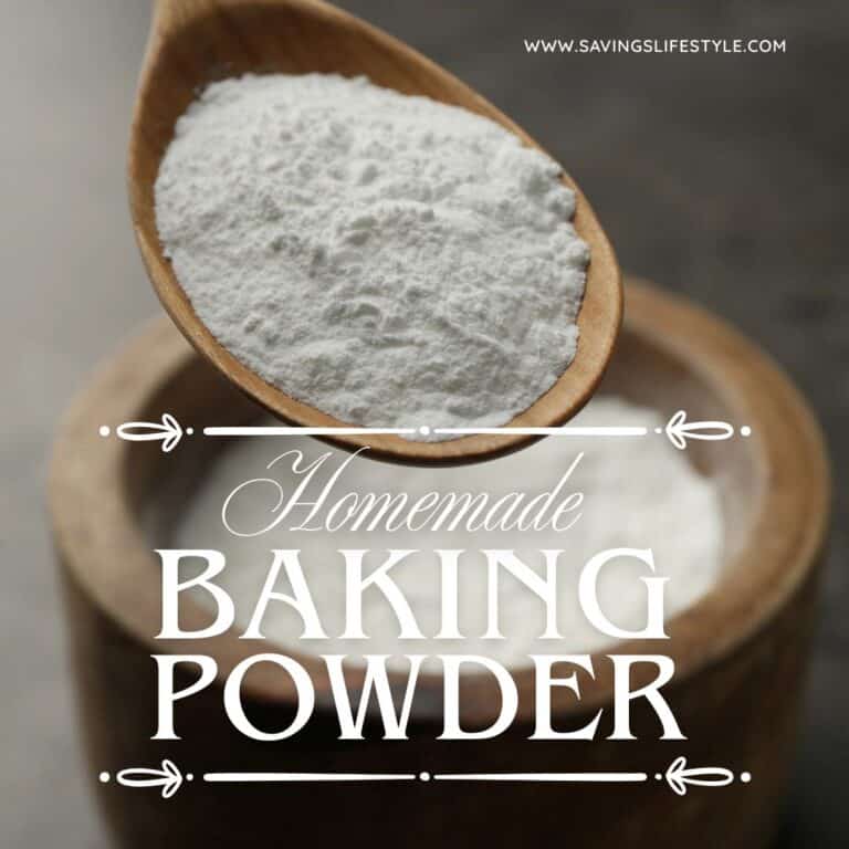 Close-up of homemade baking powder in a wooden spoon with a small bowl in the background